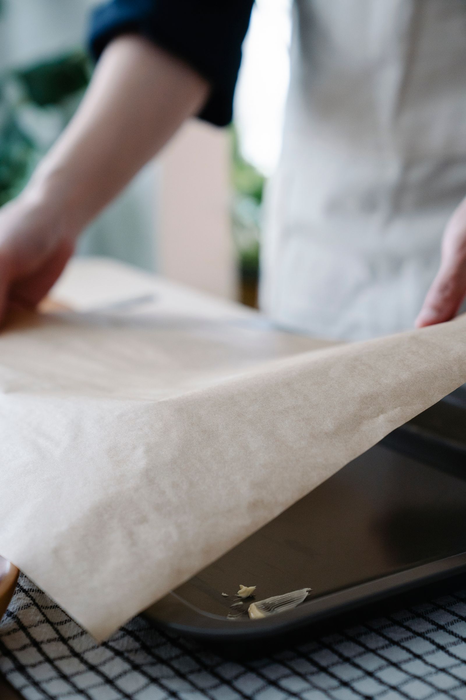 Wax paper lining the tops of kitchen cabinets