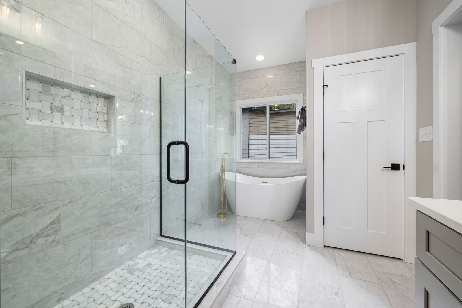 Cleaning hard-water buildup from a glass shower door